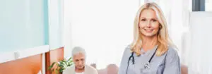 Nurse smiling in hospital