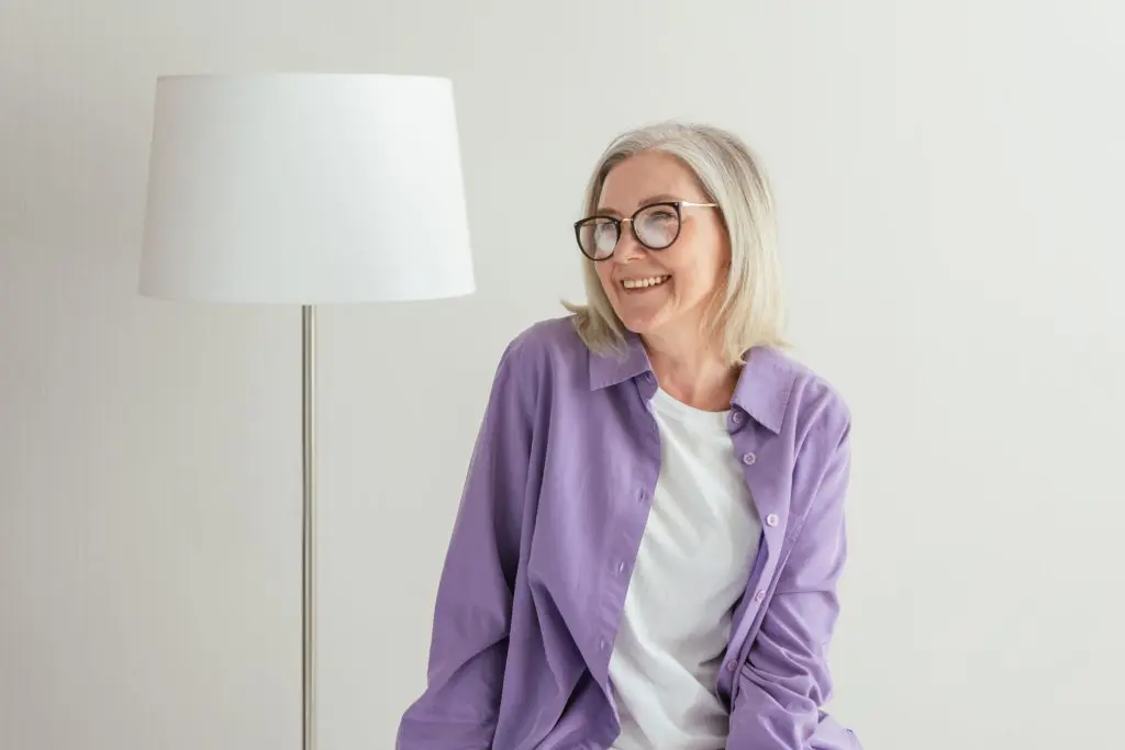 woman smiling wearing glasses