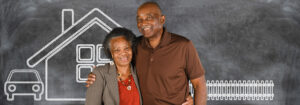 Senior couple smiling in front of chalkboard