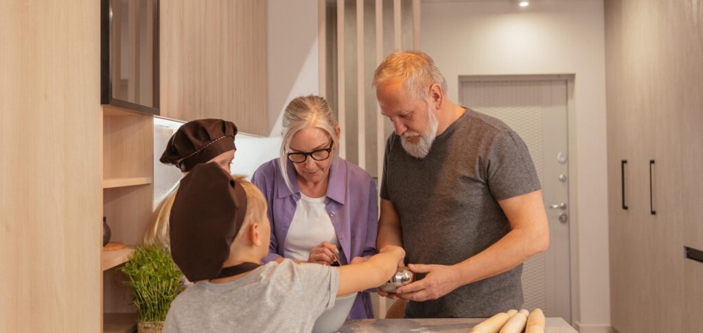 grandparents cooking with their grandchildren