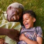 Grandfather-and-grandson-on-the-grass-300x200-1-150x150 | McGregor PACE